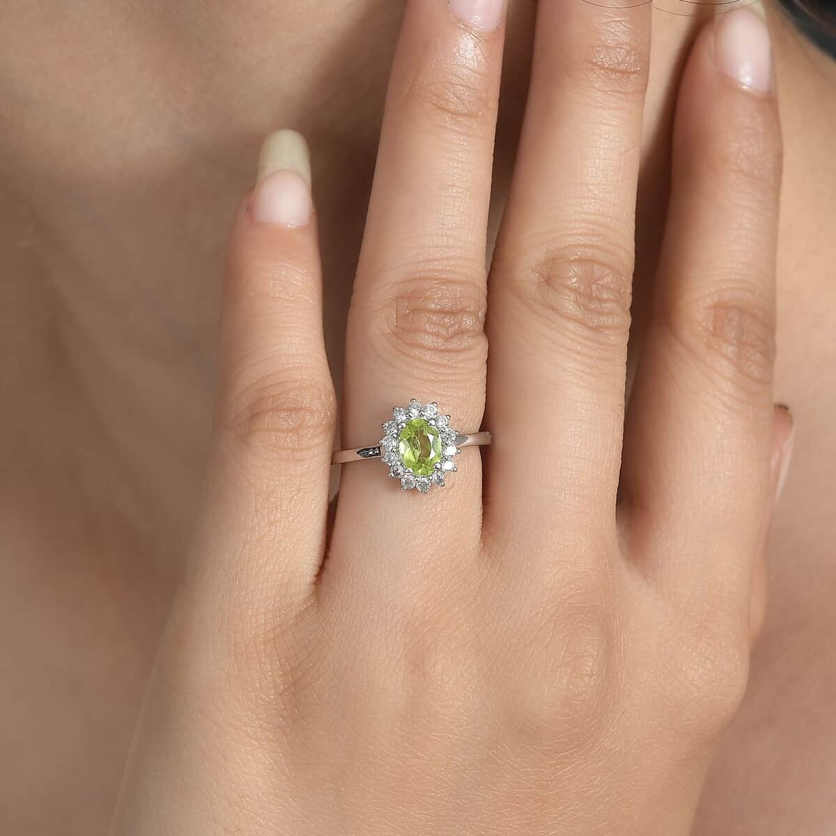 Peridot and White Zircon Sunburst Ring in Platinum Over Sterling Silver (Size 5.0) 1.25 ctw image number 2