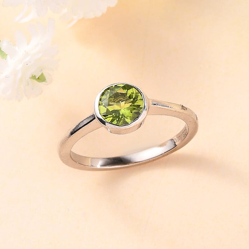 Peridot Solitaire Ring in Platinum Over Sterling Silver (Size 8.0) 0.85 ctw