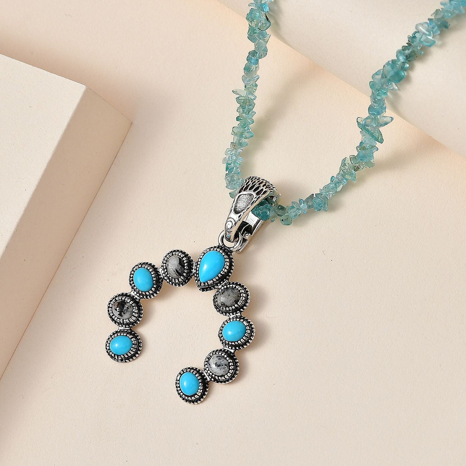 Premium Sleeping Beauty Turquoise and White Buffalo Squash Blossom Pendant with Apatite Chips Necklace 18-20 Inches in Sterling Silver 23.50 ctw