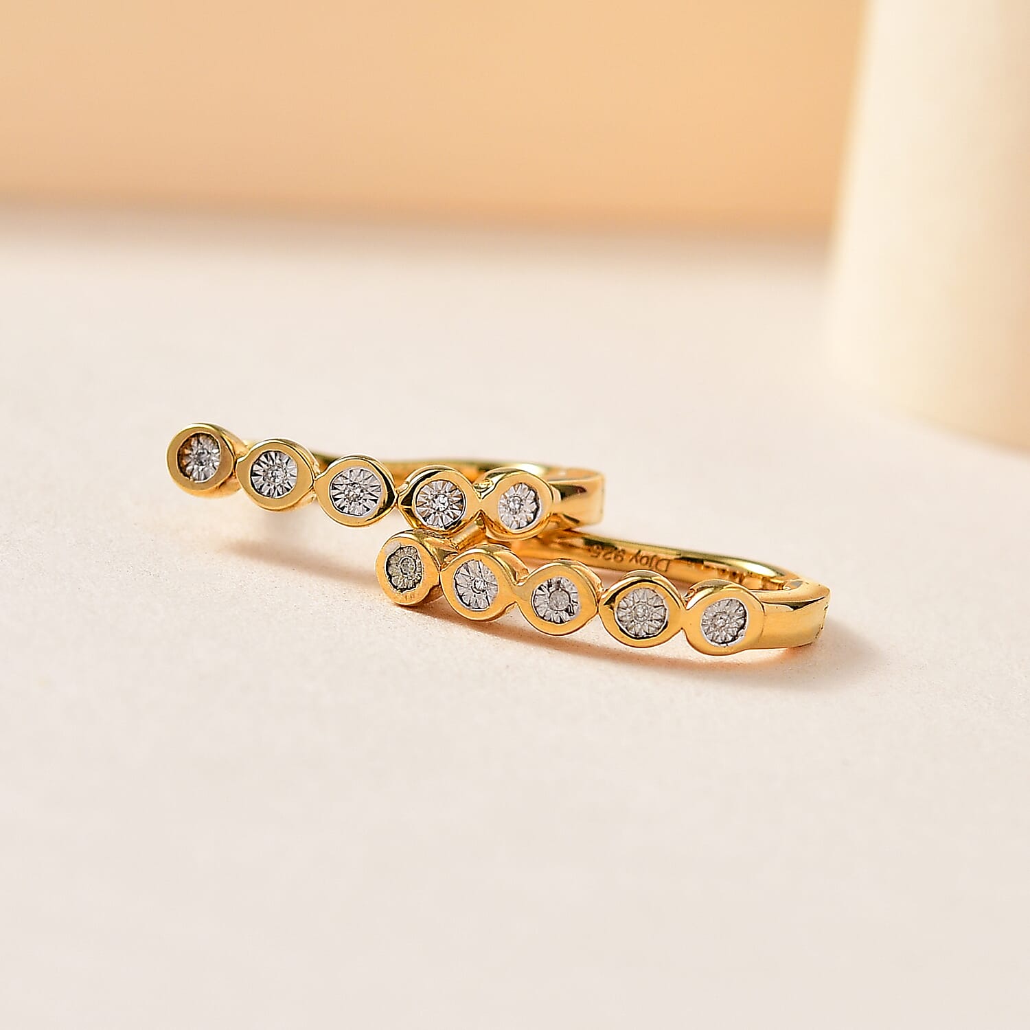 Diamond Accent Huggies Earrings in Vermeil Yellow Gold Over Sterling Silver