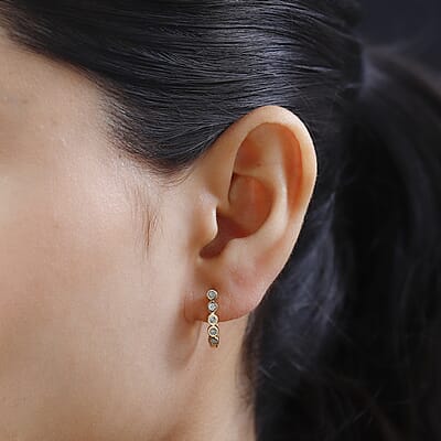 Diamond Accent Huggies Earrings in Vermeil Yellow Gold Over Sterling Silver