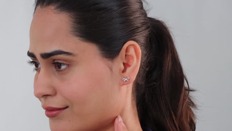 Diamond Accent Bow Knot Stud Earrings in Vermeil YG Over Sterling Silver