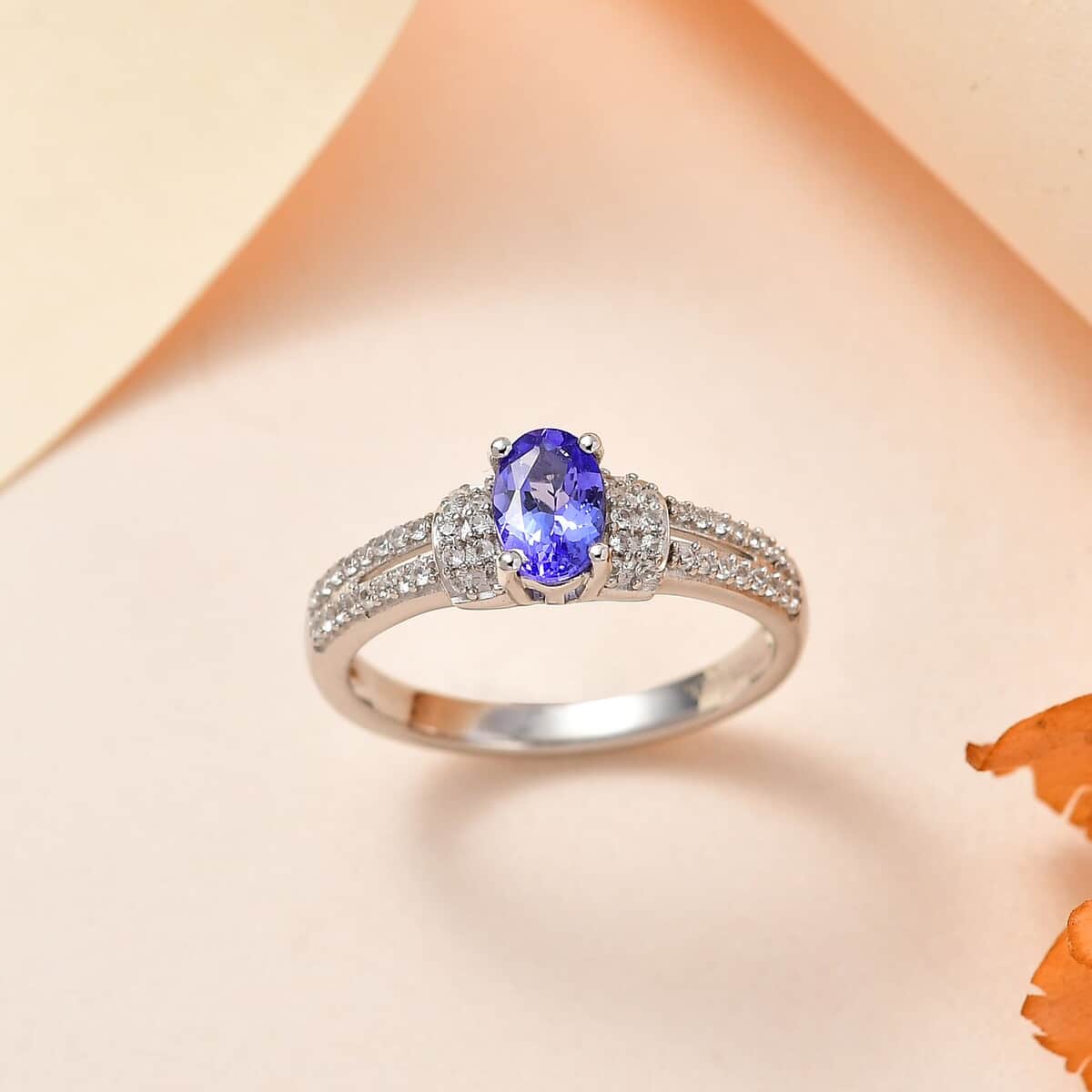 AAA Tanzanite, White Zircon Ring in Platinum Over Sterling Silver (Size 10.0) 0.75 ctw image number 1