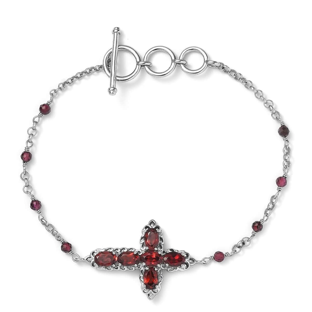 Karis Mozambique Garnet Cross Bracelet in Platinum Bond (6.50-8.00In) 5.00 ctw image number 0