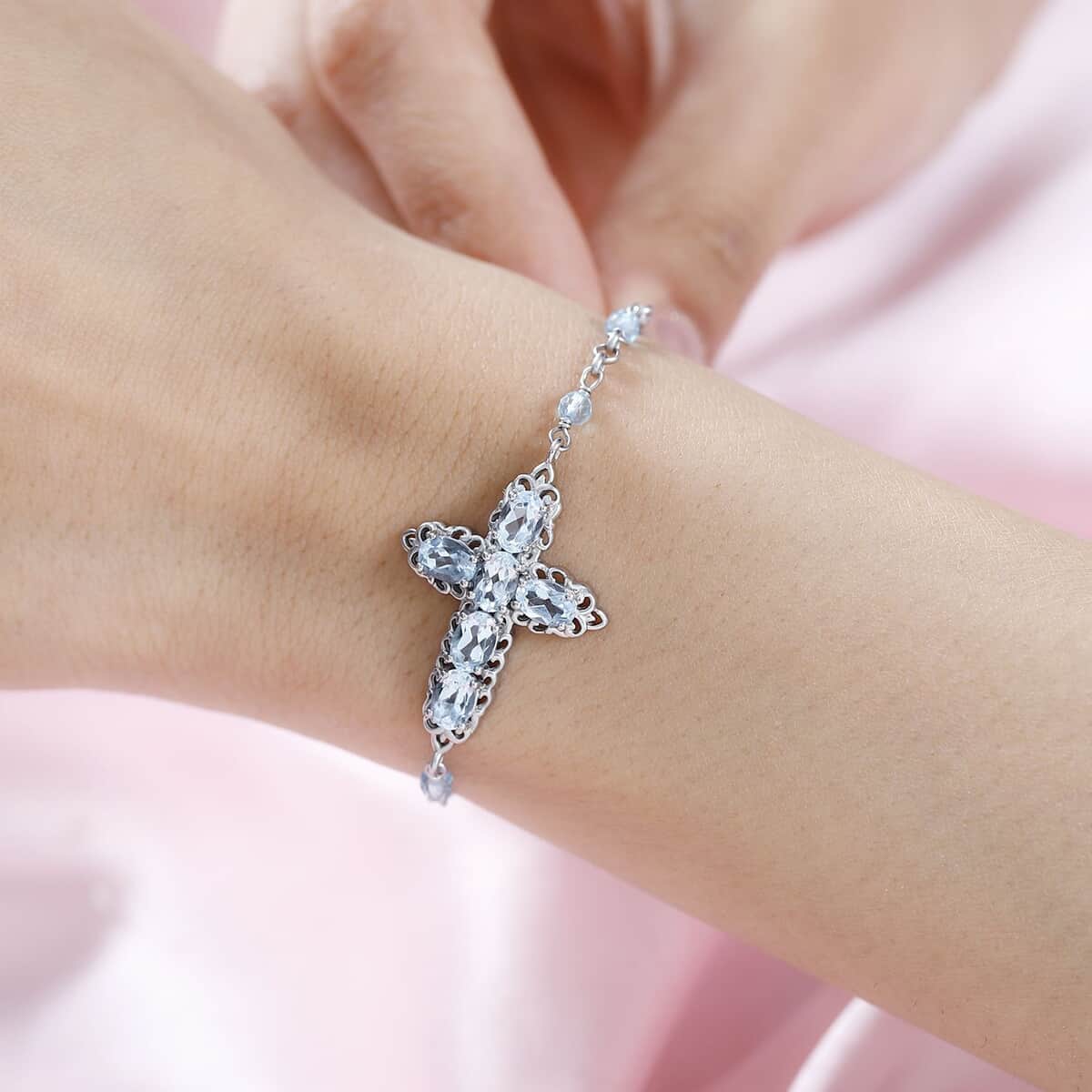 Karis Sky Blue Topaz Cross Bracelet in Platinum Bond (6.50-8.00In) 5.75 ctw image number 2