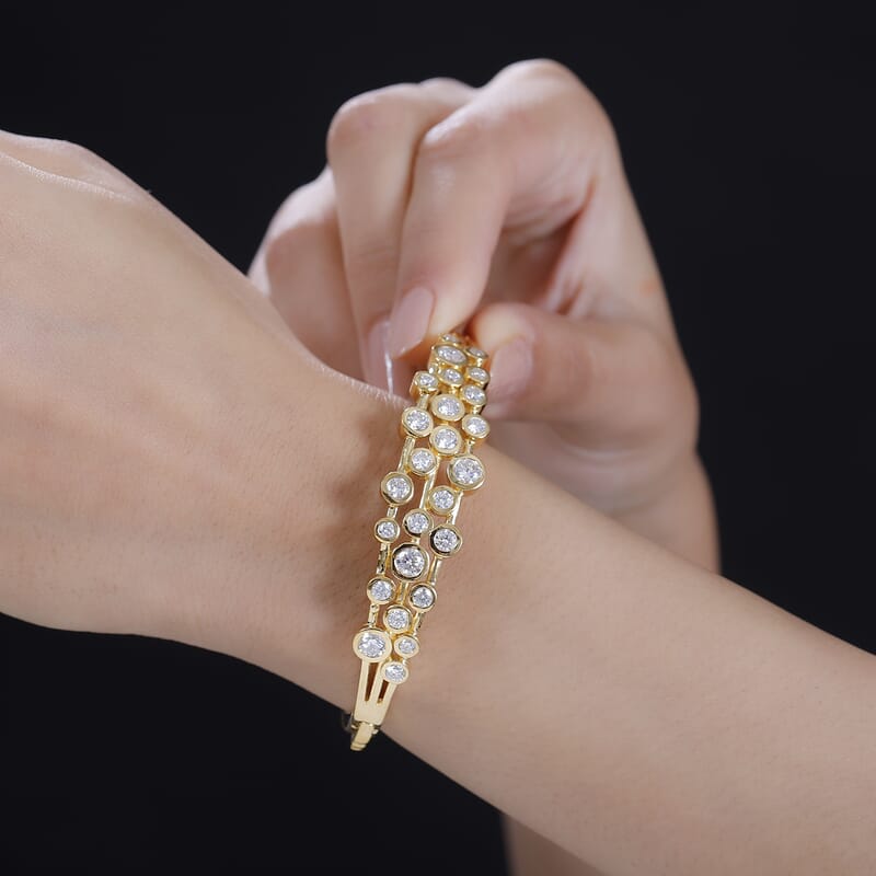 Moissanite 5.15 ctw Bangle Bracelet in Vermeil Yellow Gold Over Sterling Silver (7.25 In)