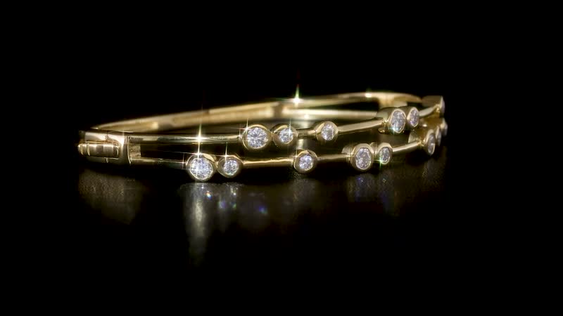 Moissanite Bangle Bracelet in Platinum Over Sterling Silver (7.50 In) 2.10 ctw