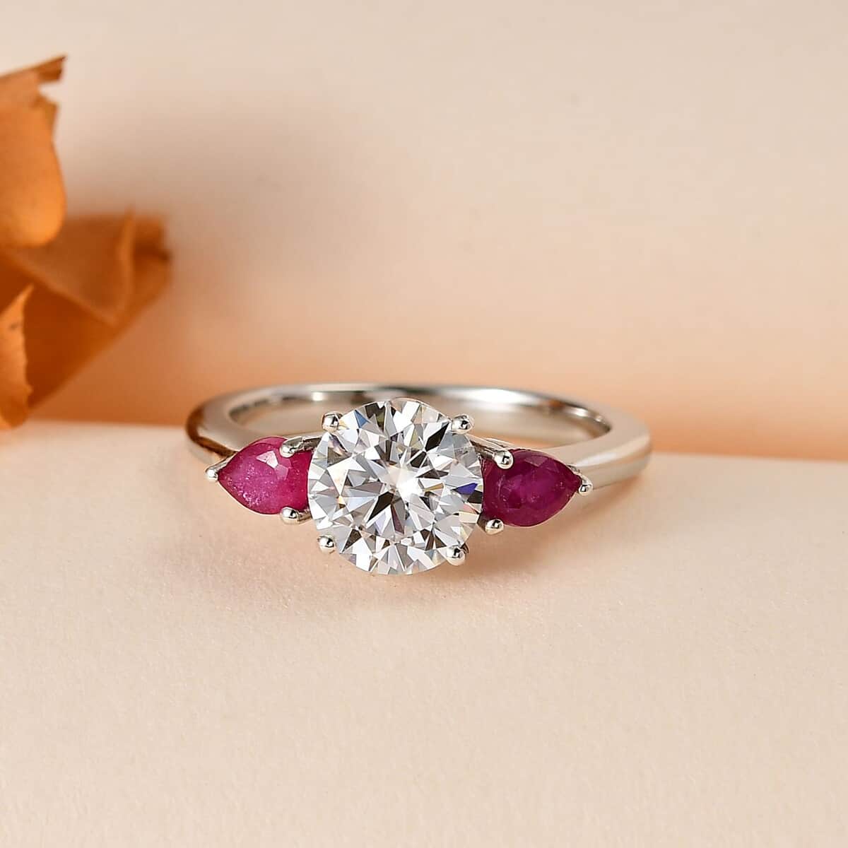 Moissanite and Niassa Ruby (FF) 3 Stone Ring in Platinum Over Sterling Silver (Size 9.0) 1.65 ctw image number 1