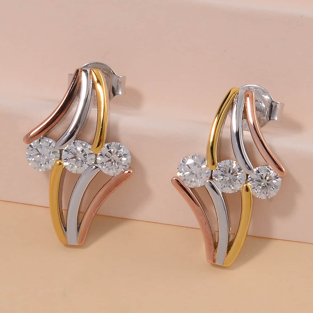 White Moissanite Earrings in 14K Yellow, Rose Gold and Rhodium Over Sterling Silver 0.90 ctw image number 1