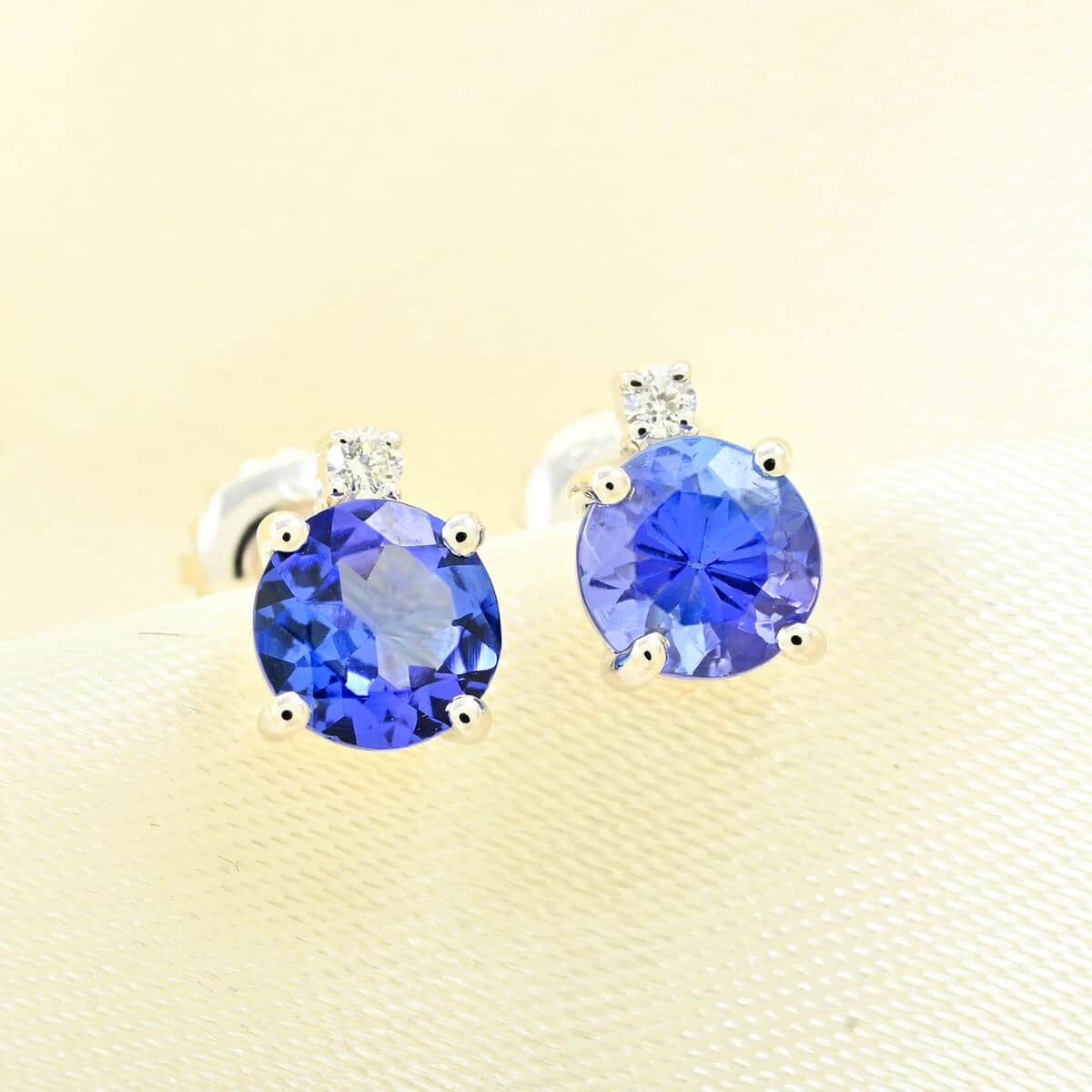 Certified & Appraised Rhapsody 950 Platinum AAAA Tanzanite and E-F VS Diamond Earrings 1.35 ctw image number 1