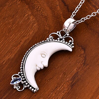 Bali Goddess Carved Bone and Tanzanite 0.25 ctw Pendant without Chain in Sterling Silver 