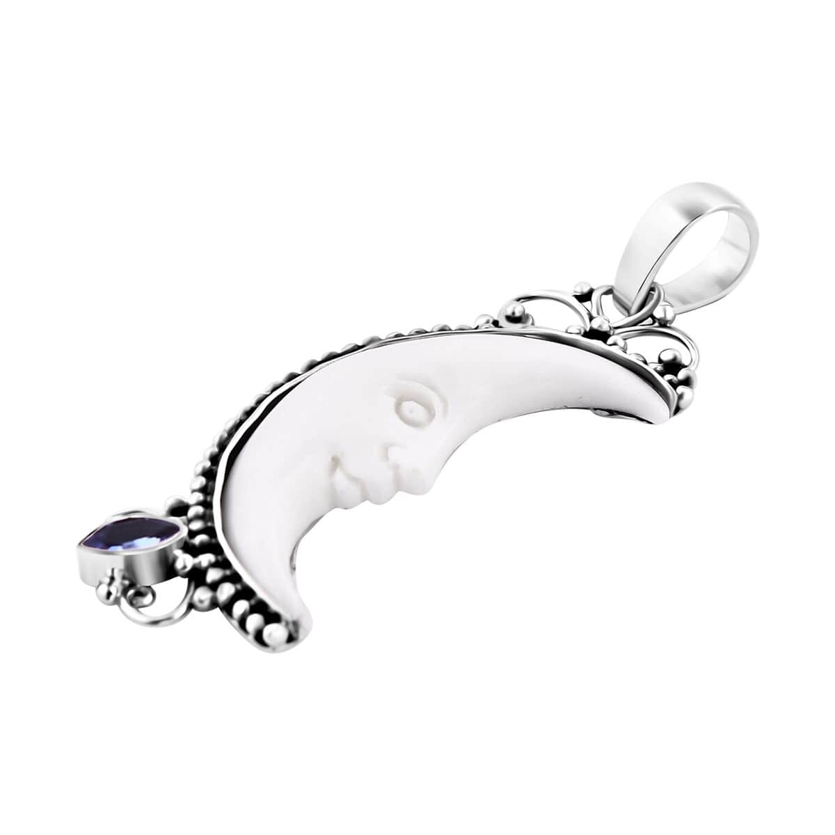 Bali Goddess Carved Bone and Tanzanite 0.25 ctw Pendant in Sterling Silver  image number 3