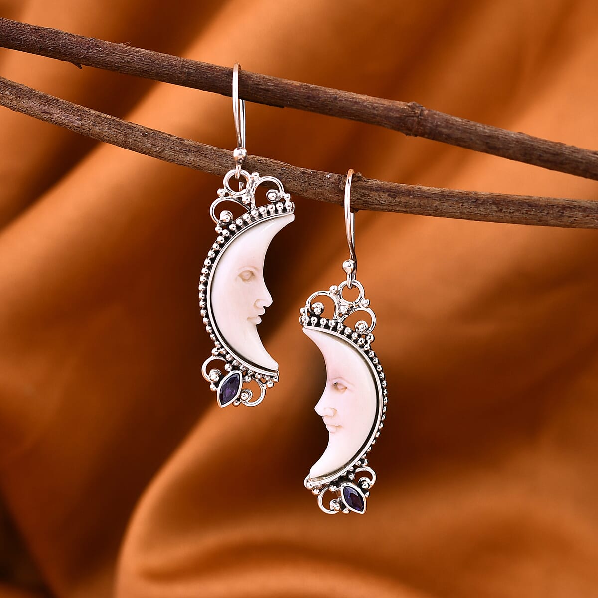 Bali Goddess Carved Bone and Tanzanite 0.30 ctw Earring in Sterling Silver  image number 1