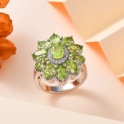 Peridot and White Zircon Floral Ring in Platinum Over Sterling Silver (Size 10.0) 6.00 ctw (Del. in 10-12 Days) 