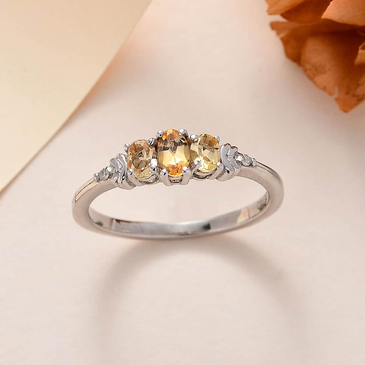 AAA Golden Imperial Topaz and Diamond 3 Stone Ring in Platinum Over Sterling Silver (Size 6.0) 0.70 ctw image number 1