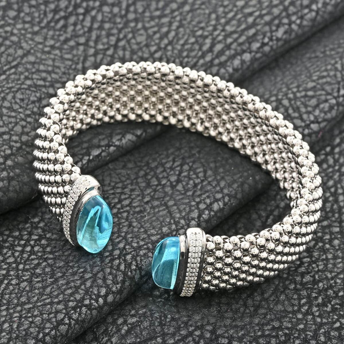 Italian Blue Topaz and Simulated Diamond Bangle Bracelet in Sterling Silver (6.50 In) image number 1