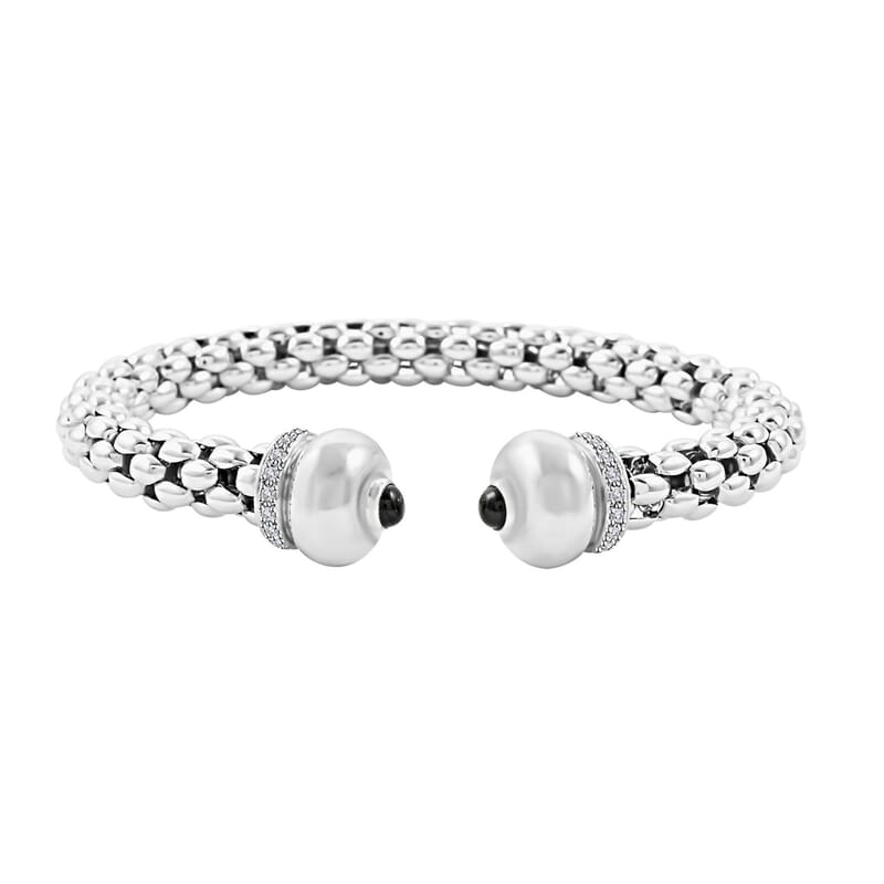Italian Black Onyx and Simulated Diamond Bangle Bracelet in Sterling Silver (6.50 In) 1.50 ctw