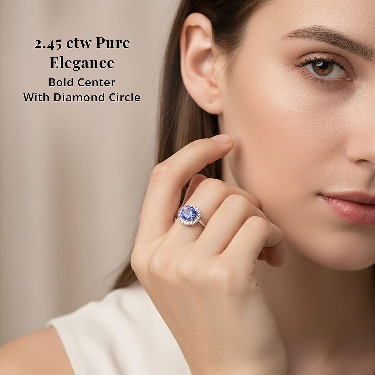 Certified and Appraised Rhapsody 950 Platinum AAAA Tanzanite and E-F VS Diamond Halo Ring (Size 8.5) 5.25 Grams 2.45 ctw image number 1