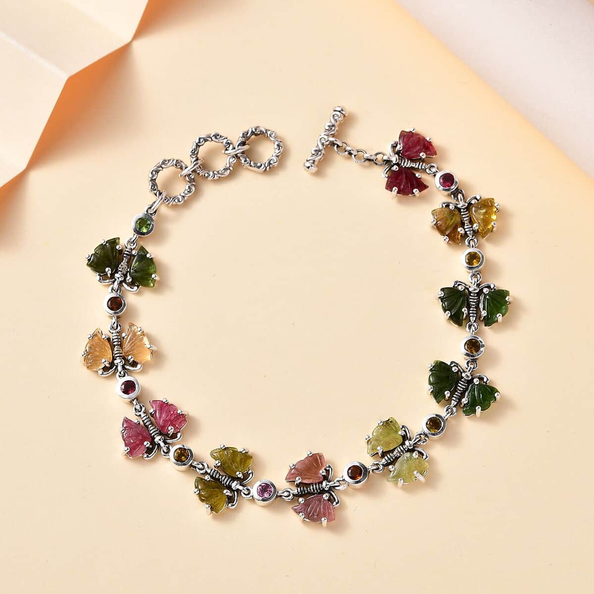 Indian Artistry Multi-Tourmaline Carved 16.40 ctw Butterfly Bracelet in Sterling Silver (6.50-8.0In) image number 1