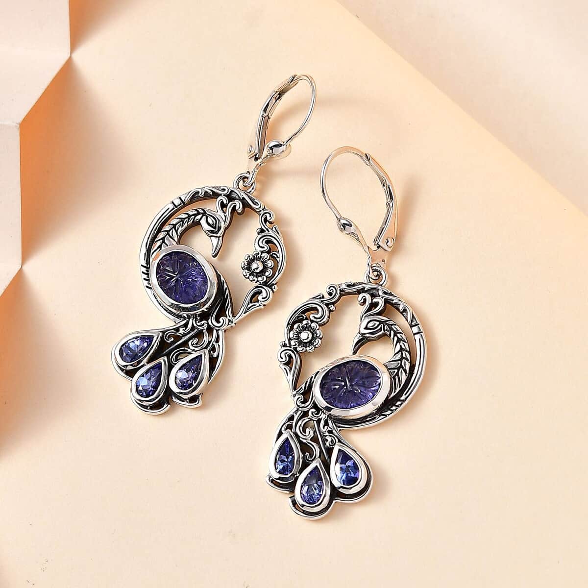 Indian Artistry Tanzanite Carved 4.80 ctw Peacock Earrings in Sterling Silver image number 1