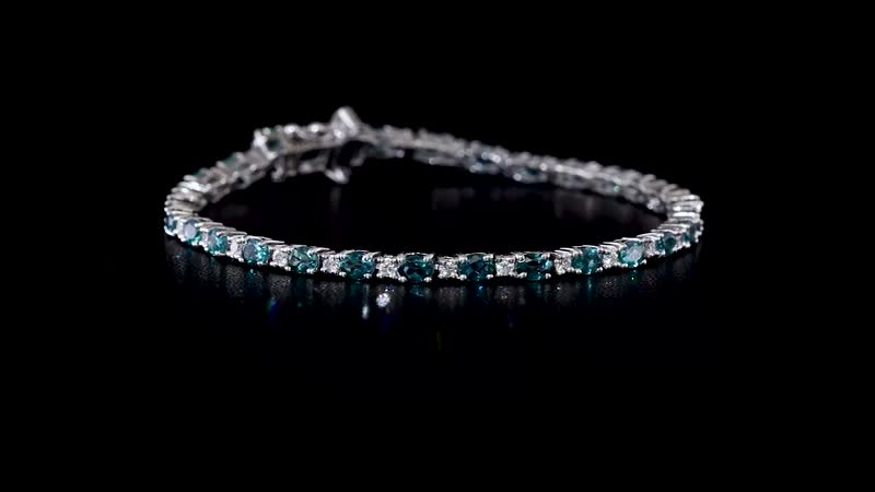 Indian Ocean Apatite and Moissanite Bracelet in Platinum Over Sterling Silver (7.25 In) 5.60 ctw