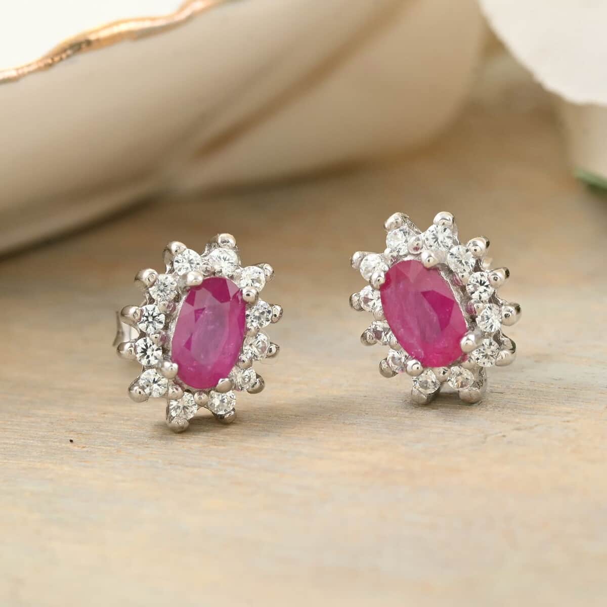 Premium Mozambique Ruby and White Zircon Sunburst Stud Earrings in Platinum Over Sterling Silver 1.10 ctw (Del. in 8-10 Days) image number 1