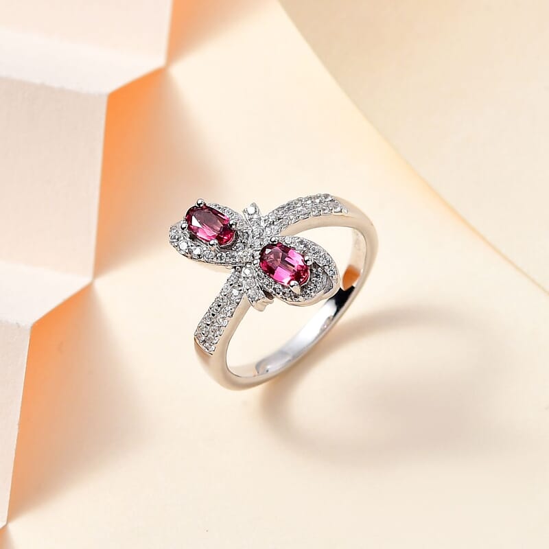 Ofiki Rubellite and White Zircon Bow Ring in Platinum Over Sterling Silver (Size 10.0) 1.00 ctw
