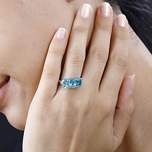 Paraiba Apatite and Diamond 3.76 ctw 3 Stone Ring in Rhodium Over Sterling Silver (Size 10)