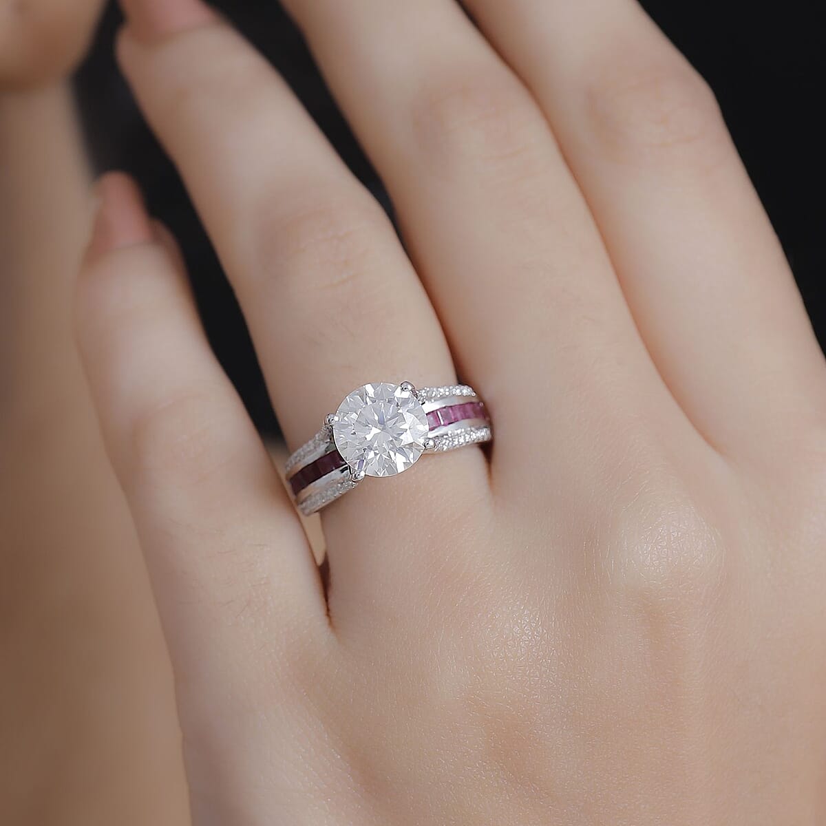 Moissanite and Niassa Ruby (FF) 3.80 ctw Bridge Ring in Platinum Over Sterling Silver (Size 11.0) image number 2
