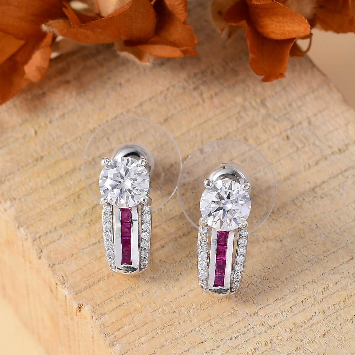 Moissanite and Niassa Ruby (FF) 2.10 ctw Earrings in Platinum Over Sterling Silver image number 1