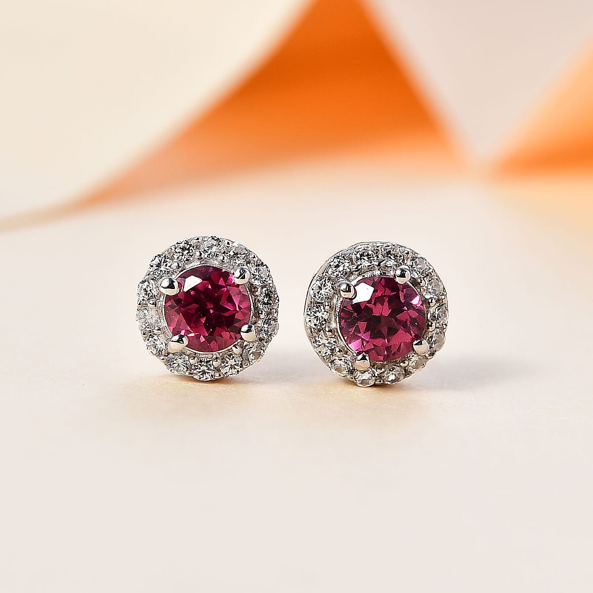 Tanzanian Wine Garnet and White Zircon Halo Stud Earrings in Rhodium Over Sterling Silver 1.00 ctw image number 1