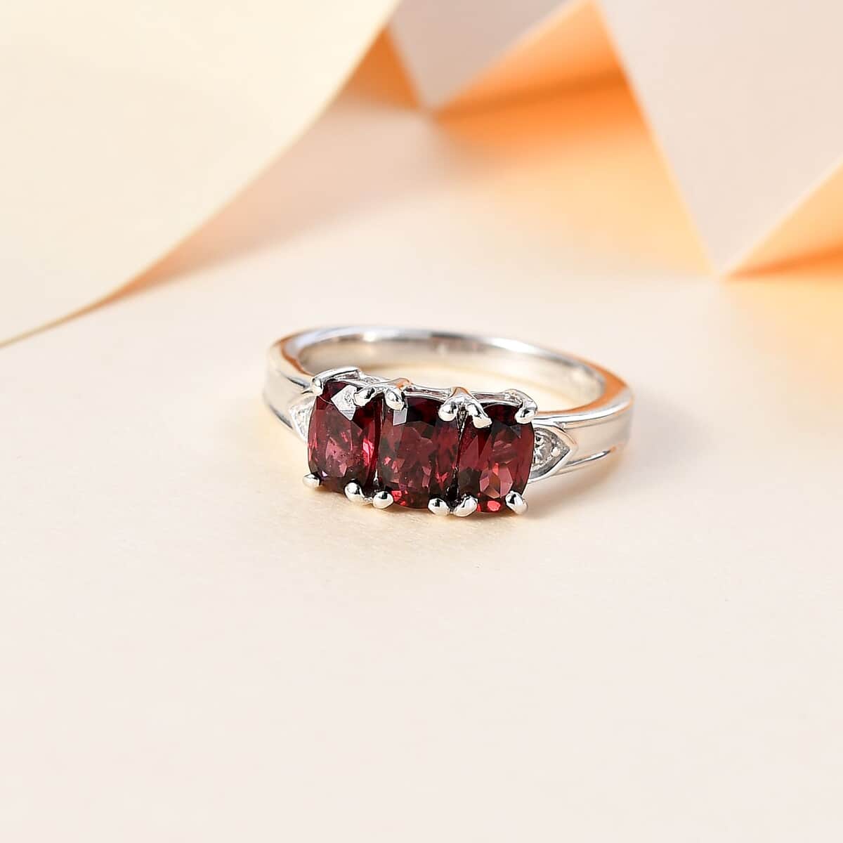 Tanzanian Wine Garnet and White Zircon Trilogy Ring in Rhodium Over Sterling Silver (Size 10.0) 2.20 ctw image number 1