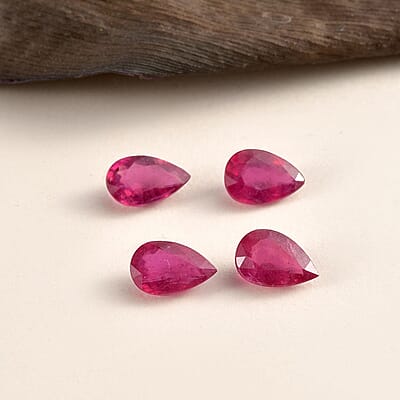 AA Niassa Ruby (FF) Set of 4 (Pear 9x6 mm) 6.20 ctw Loose gemstone