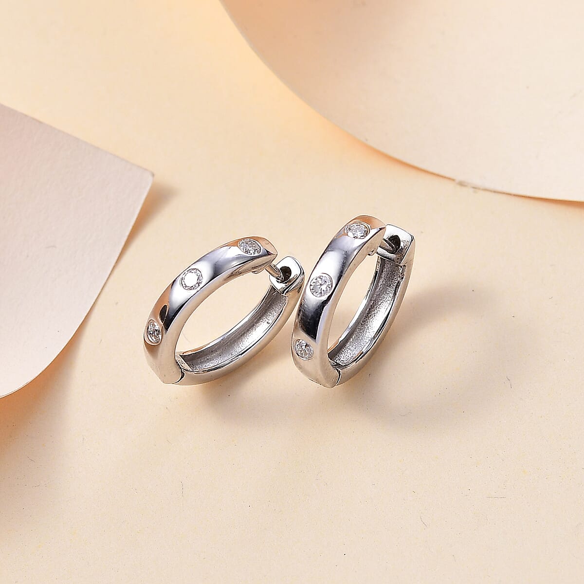 Moissanite Hoop Earrings in Rhodium Over Sterling Silver 0.25 ctw image number 1