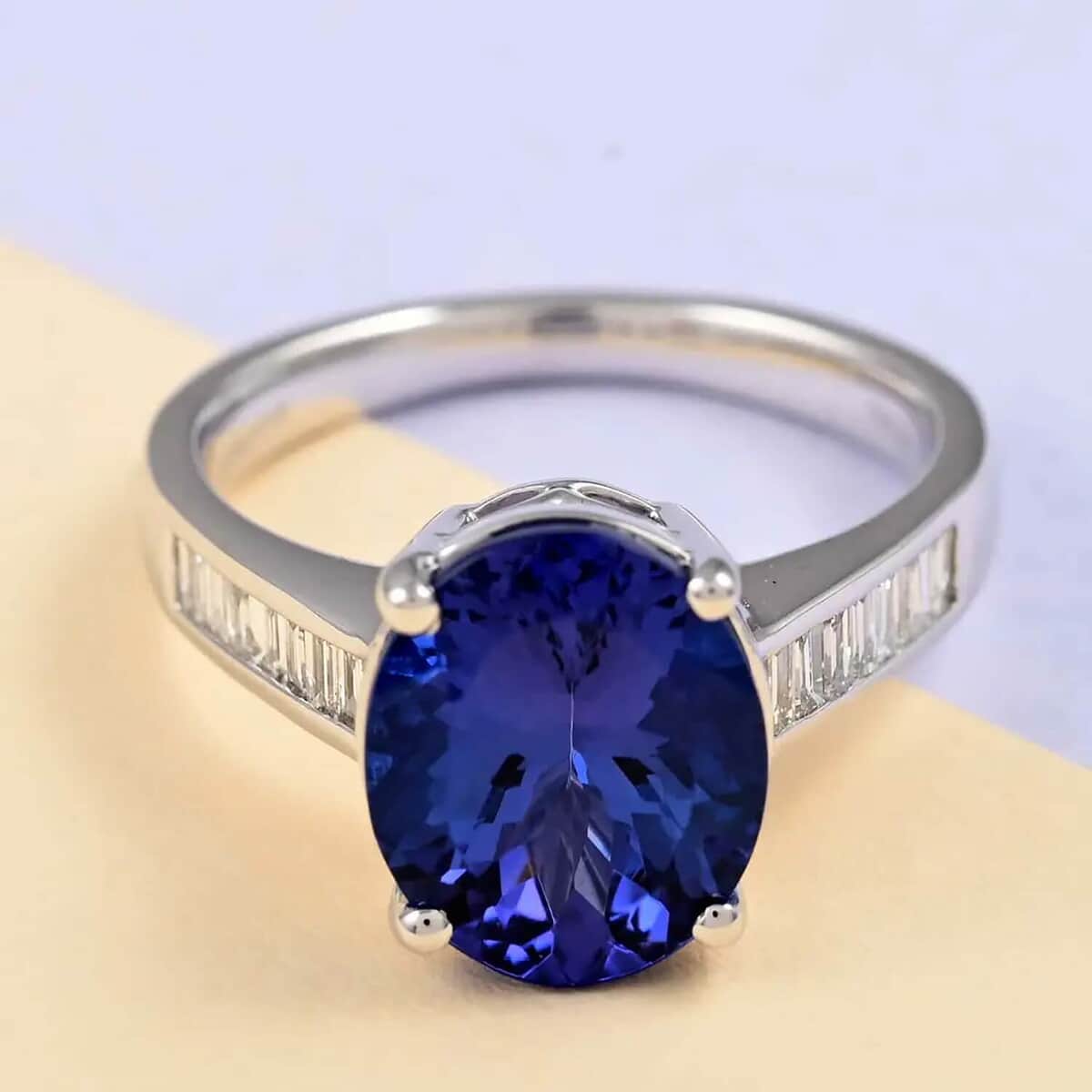 Mother’s Day Gift Certified and Appraised Rhapsody 950 Platinum AAAA Tanzanite and E-F VS Diamond Ring (Size 10.5) 6.10 Grams 4.20 ctw image number 1