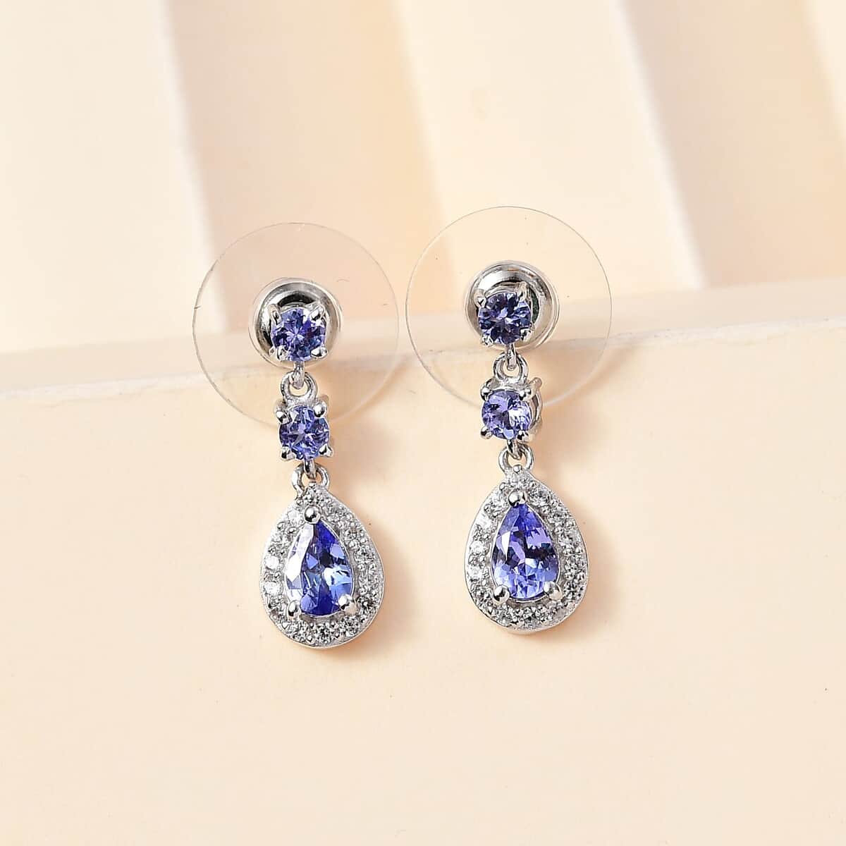 Tanzanite and White Zircon Drop Earrings in Rhodium Over Sterling Silver 1.50 ctw image number 1
