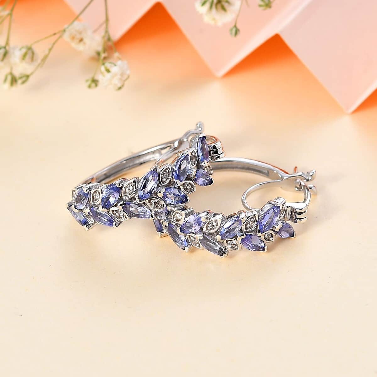 Tanzanite and White Zircon Leaf Hoop Earrings in Platinum Over Sterling Silver 3.10 ctw (Del. in 10-12 Days) image number 1