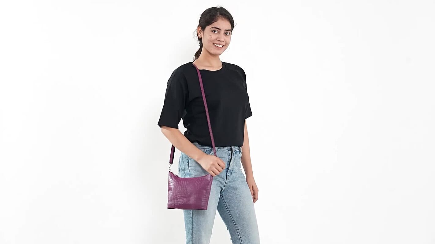 Croco Embossed Genuine Leather  Sling/Crossbody bag  Measurement- Top Length- 9.5'' Bottom Length- 8.5'' Height-6'' Bottom width- 2'' Color- Black