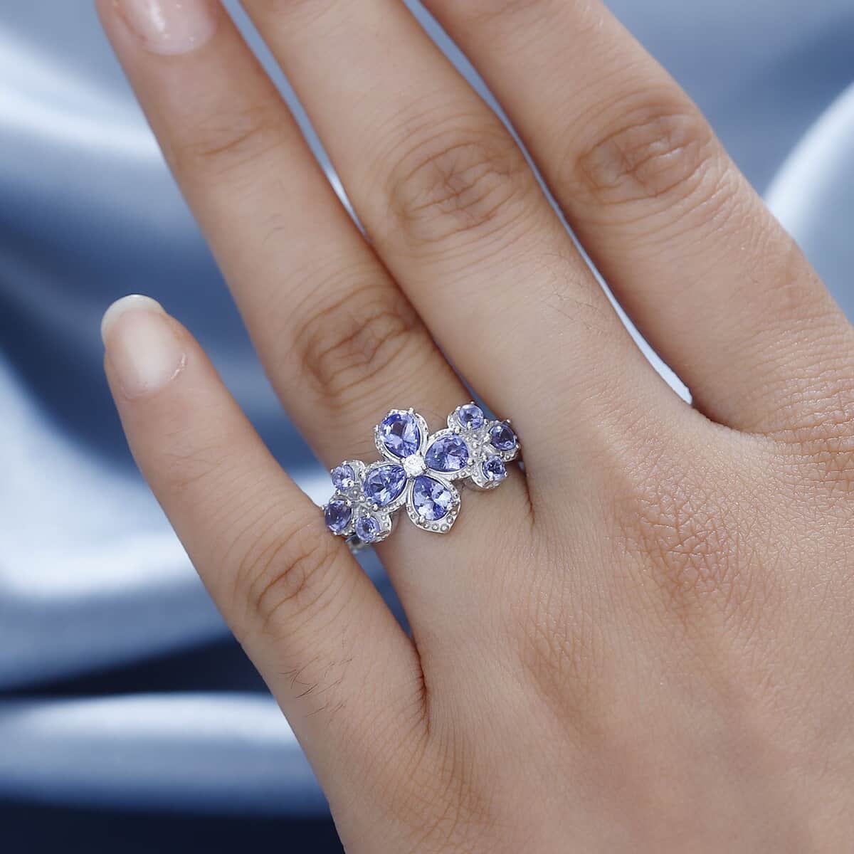 AAA Tanzanite and White Zircon Plumeria Floral Ring in Rhodium Over Sterling Silver (Size 10.0) 1.80 ctw image number 2