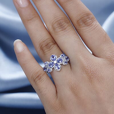 AAA Tanzanite and White Zircon Plumeria Floral Ring in Rhodium Over Sterling Silver (Size 10.0) 1.80 ctw