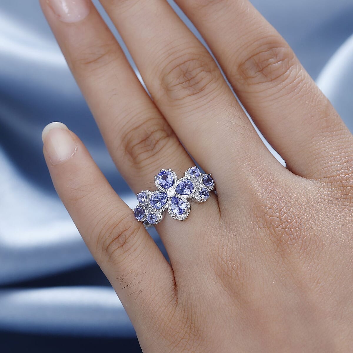 AAA Tanzanite and White Zircon Plumeria Floral Ring in Rhodium Over Sterling Silver (Size 7.0) 1.80 ctw image number 2