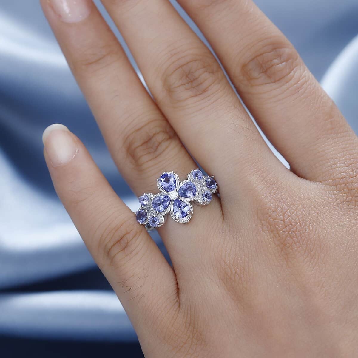 AAA Tanzanite and White Zircon Plumeria Floral Ring in Rhodium Over Sterling Silver (Size 8.0) 1.80 ctw image number 2