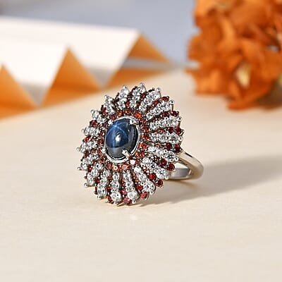 Blue Star Sapphire (DF), Brown and White Zircon Star Ray Ring in Platinum Over Sterling Silver (Size 10.0) 7.40 ctw
