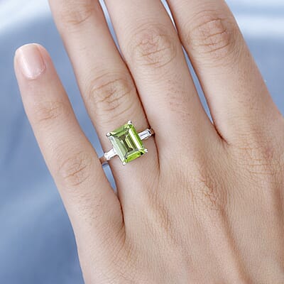Peridot and Moissanite Ring in Rhodium Over Sterling Silver (Size 6.0) 3.30 ctw