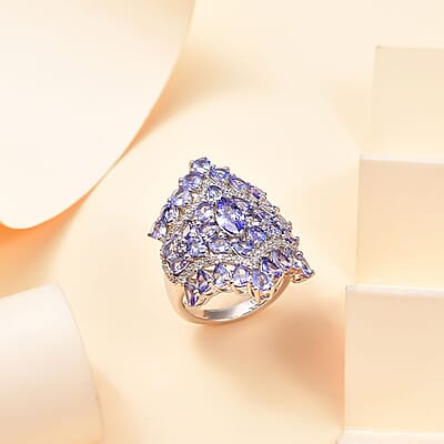 Tanzanite and White Zircon 6.00 ctw Floral Ring in Platinum Over Sterling Silver (Size 5.0)