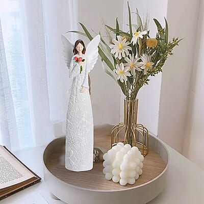 Resin Angel Holding Flowers Figurine