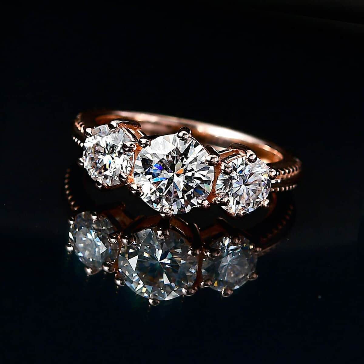 Moissanite 1.75 Ctw 3 Stone Ring in Vermeil Rose Gold Over Sterling Silver (Size 9.0) image number 1