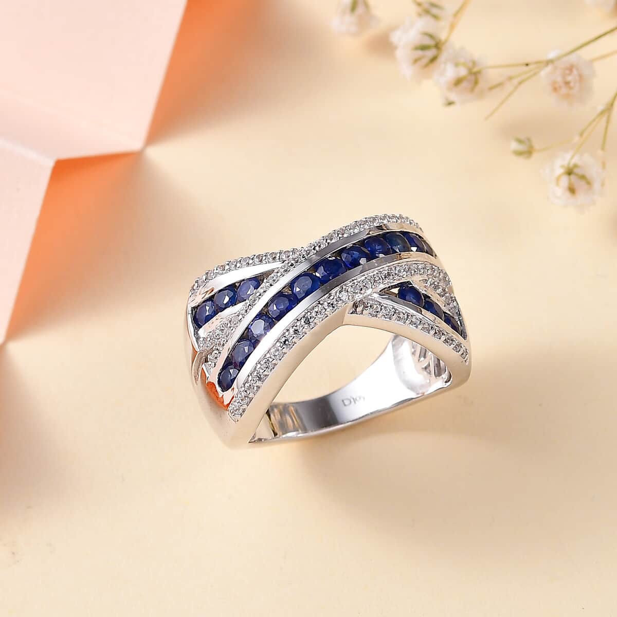 Premium Ceylon Blue Sapphire and White Zircon Criss Cross Ring in Rhodium Over Sterling Silver (Size 9.0) 2.15 ctw image number 1