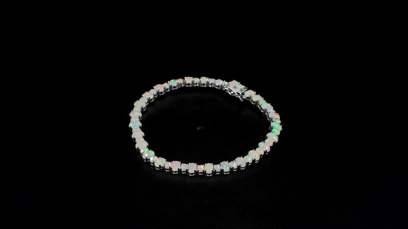 Ethiopian Welo Opal 8.90 ctw Tennis Bracelet in Rhodium Over Sterling Silve (6.50 In)