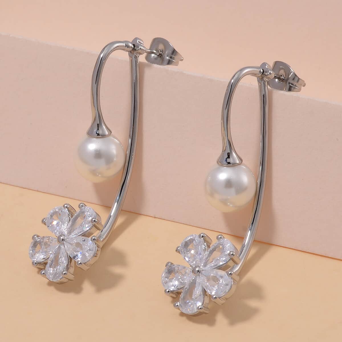 White Shell Pearl and Simulated Diamond Earrings in Silvertone and Stainless Steel image number 1